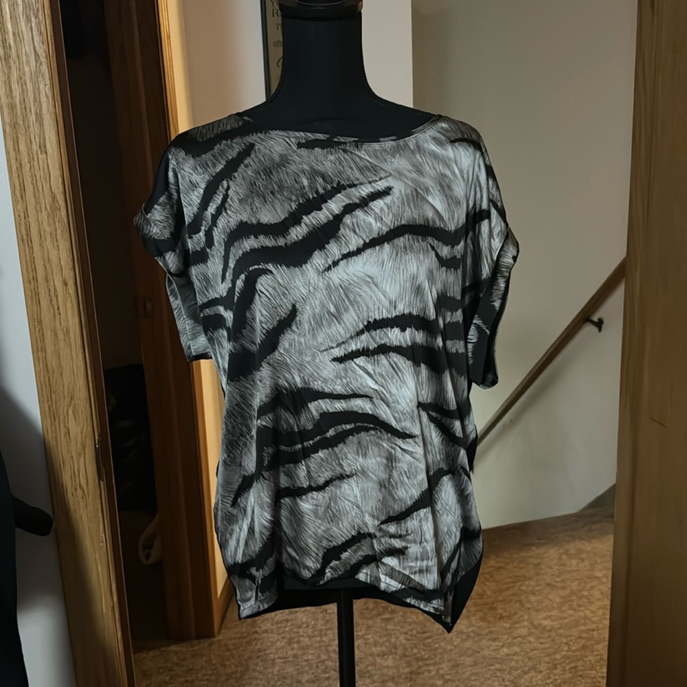 Excellent condition and perfect for layering